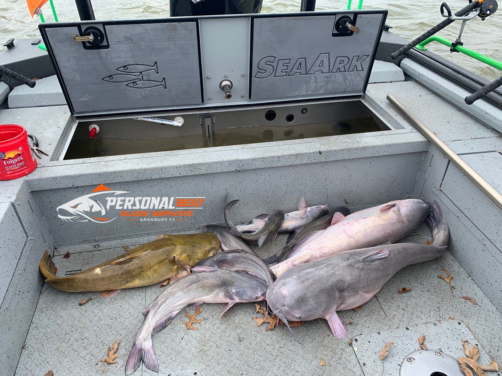 A guide working with a client on the water, photographed by Personal Best Guide Service in TX
