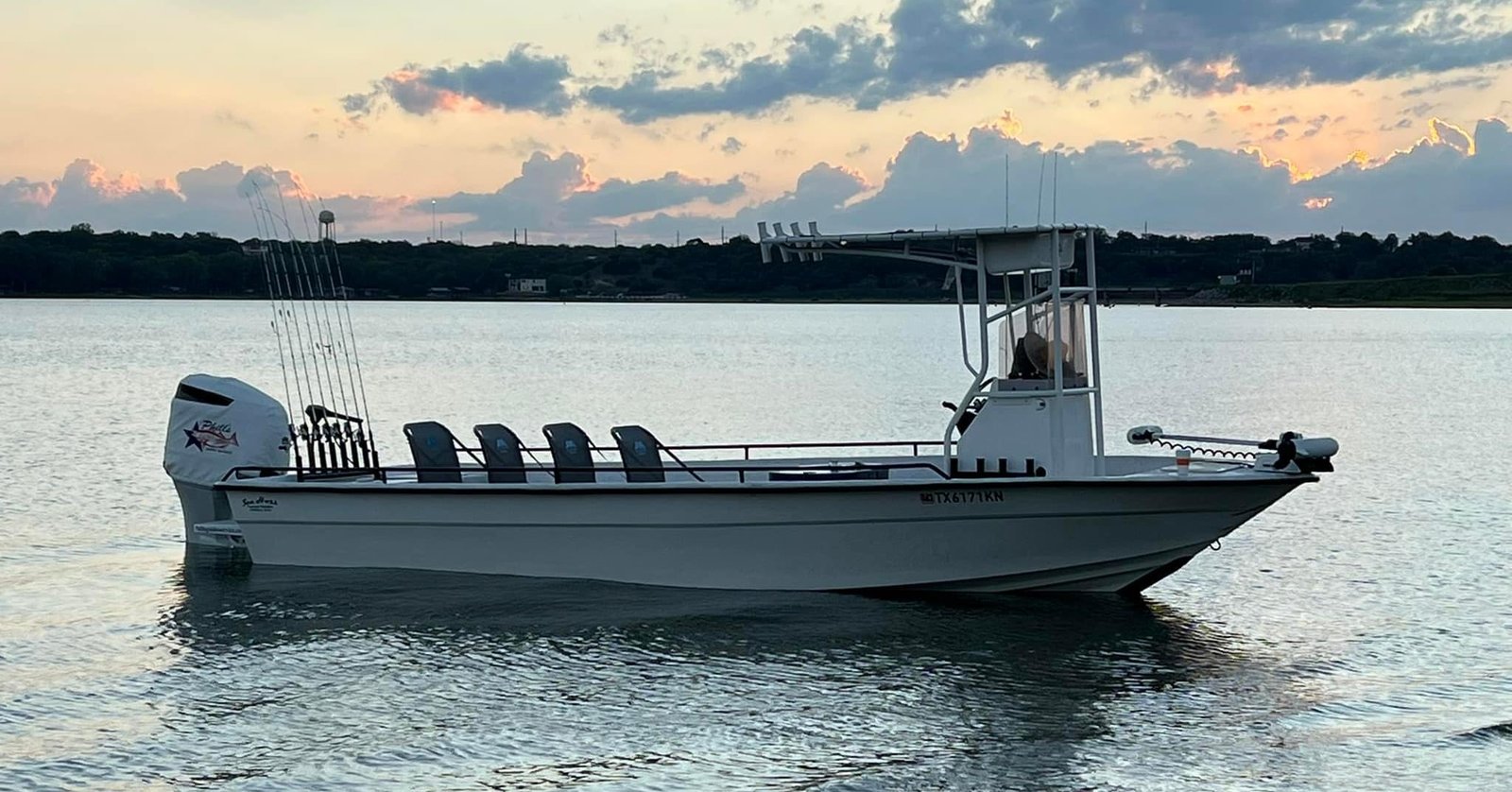 A guide working with a client on the water, photographed by Phill's Guide Service in TX