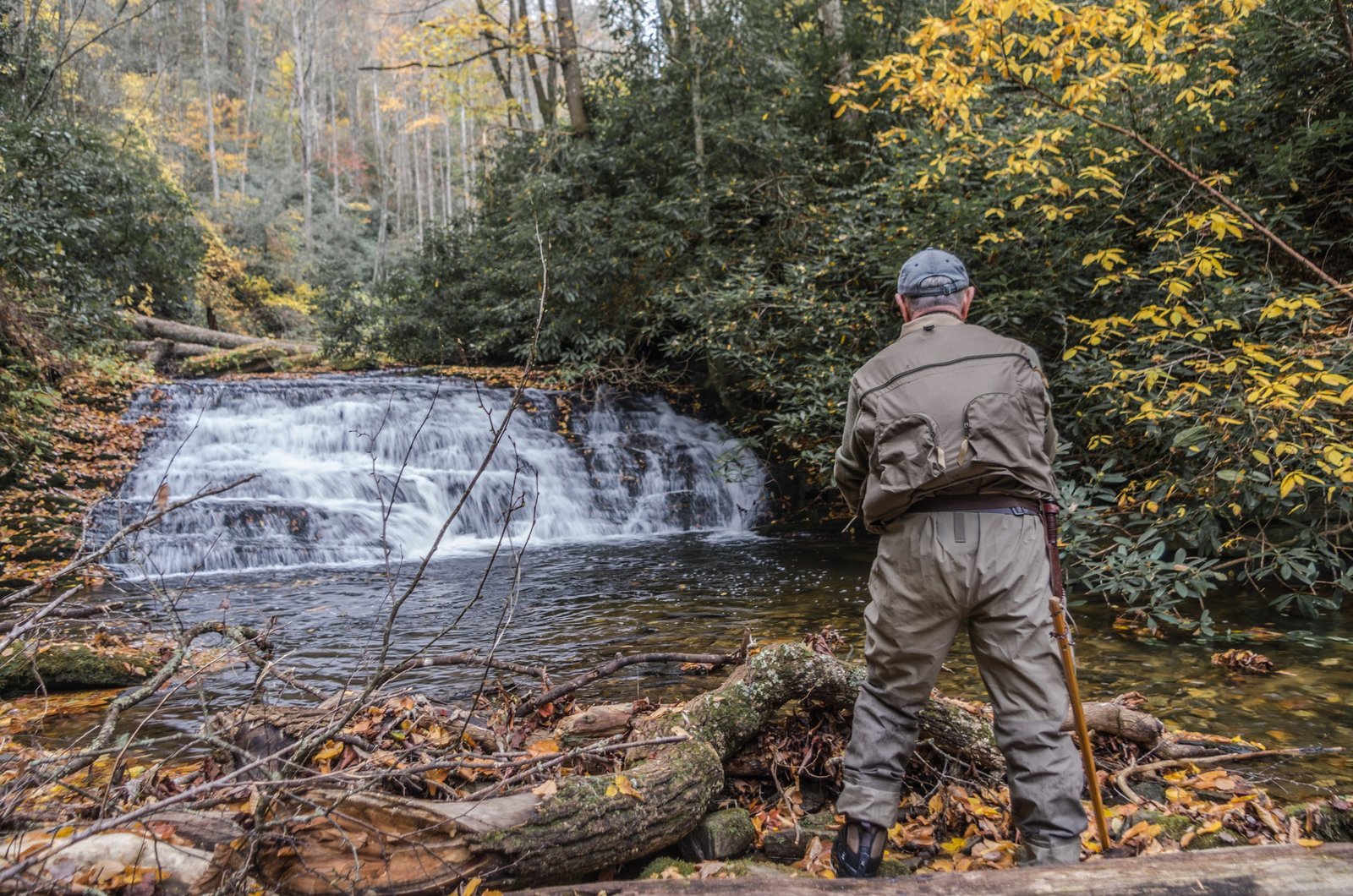 A guide working with a client on the water, photographed by Pisgah Outdoors in NC