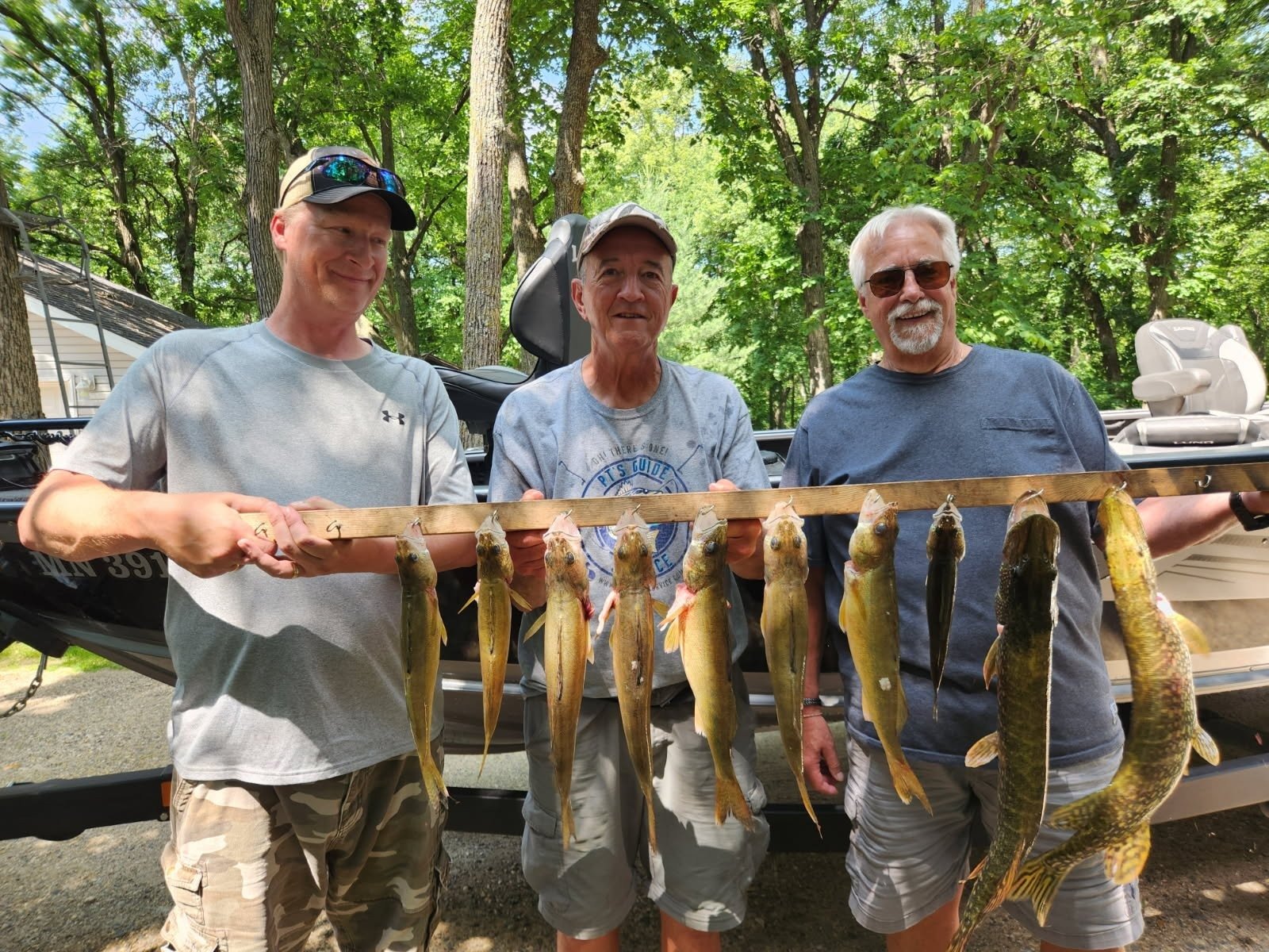 A guide at work during a trip, photographed by PT's Fishing Guide Service in MN