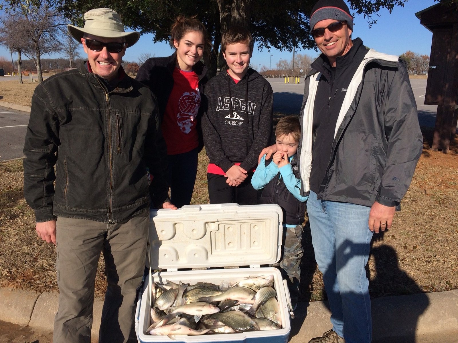 A guide working with a client on the water, photographed by Reelin Ray Roberts Guide Service in TX