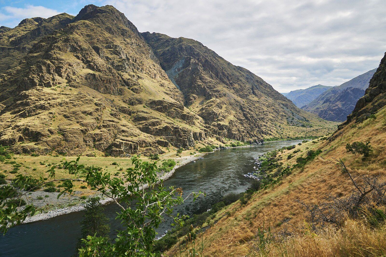 A guide working with a client on the water, photographed by Salmon Raft in ID