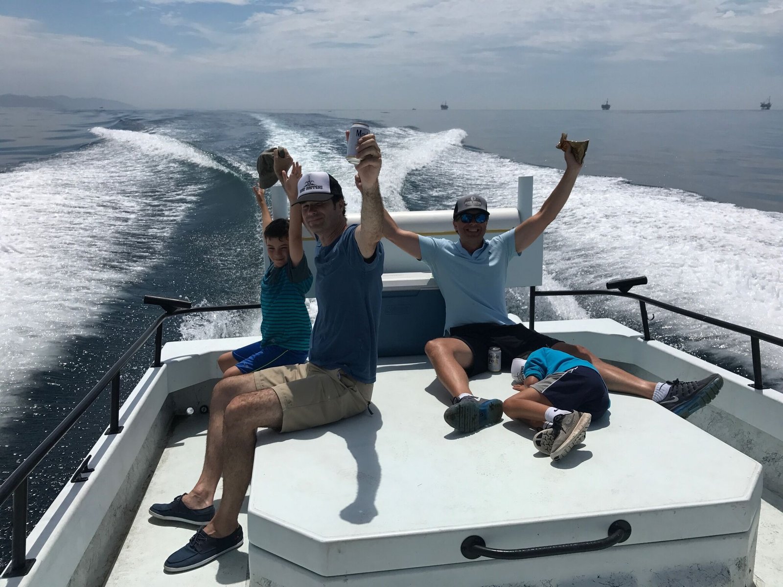 A guide working with a client on the water, photographed by Santa Barbara Sportfishing Charters in CA