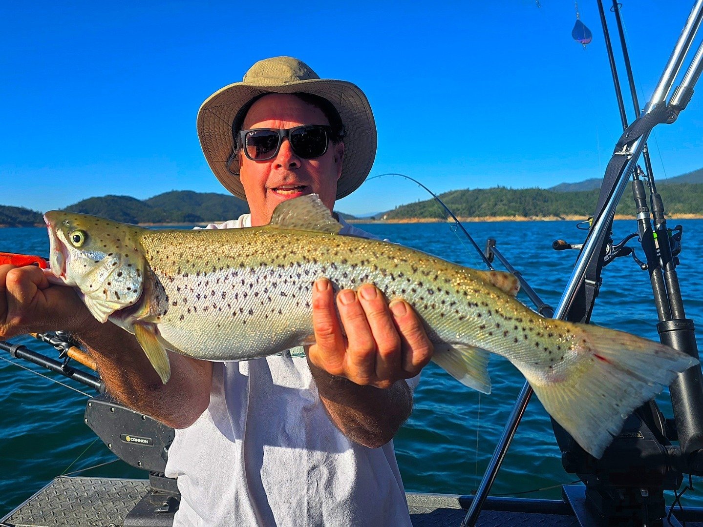 A guide working with a client on the water, photographed by SC Guide Service in CA