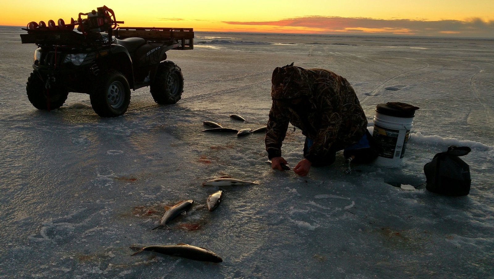 A guide working with a client on the water, photographed by Small Craft Advisory Guide Service in WI