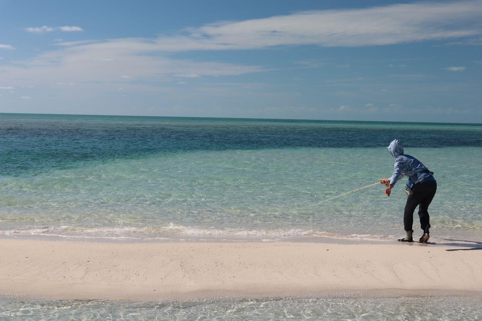 The job of guiding, mid-trip, photographed by Solstice Fly Fishing in MA