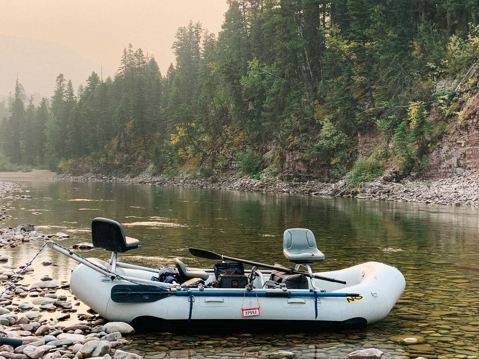 A guide working with a client on the water, photographed by Spotted Bear Ranch in MT