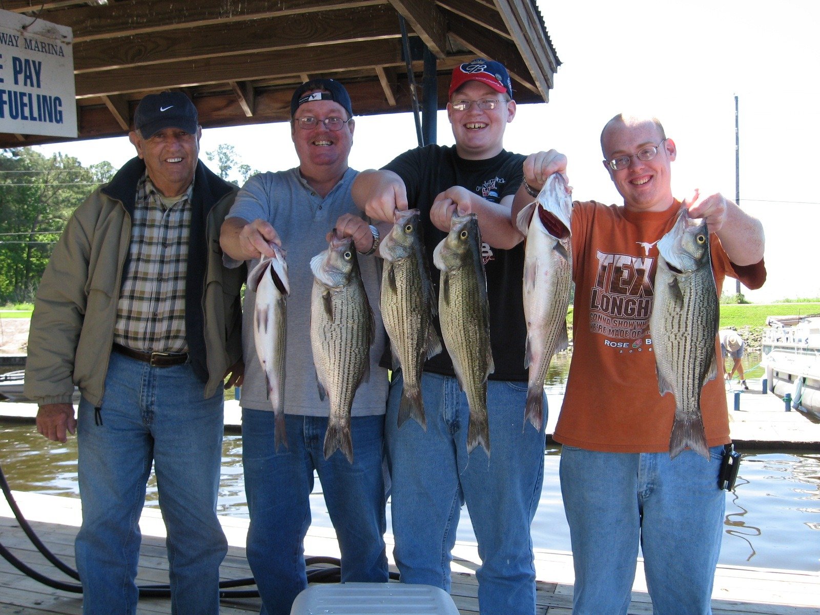 A guide working with a client on the water, photographed by The Fish Dude's Guide Service in TX