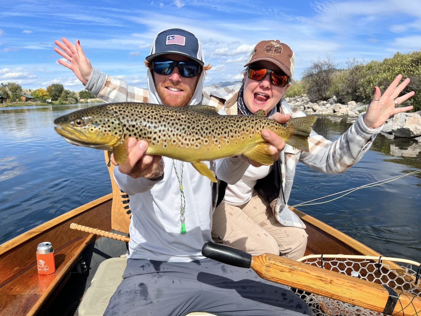 A guide working with a client on the water, photographed by The Lodge at Eagle Rock in MT