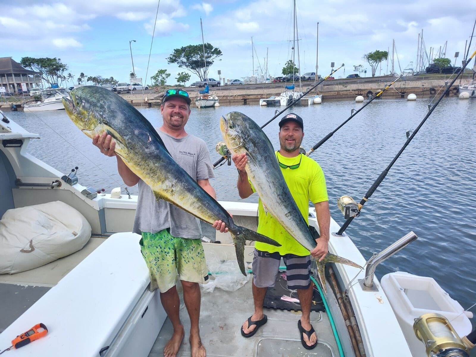 A guide working with a client on the water, photographed by To The Max Charters in HI