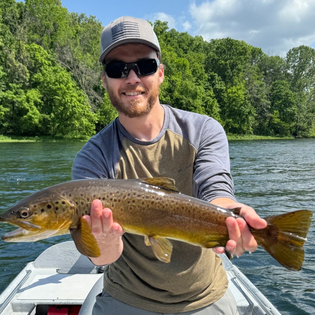 A working outfitter partway through a day, photographed by Wandering Fly Outfitters in AR