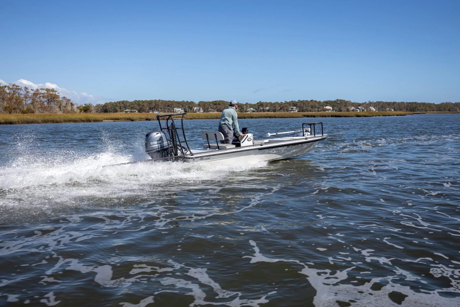 A guide at work during a trip, photographed by Wilmington Fishing Expeditions in NC